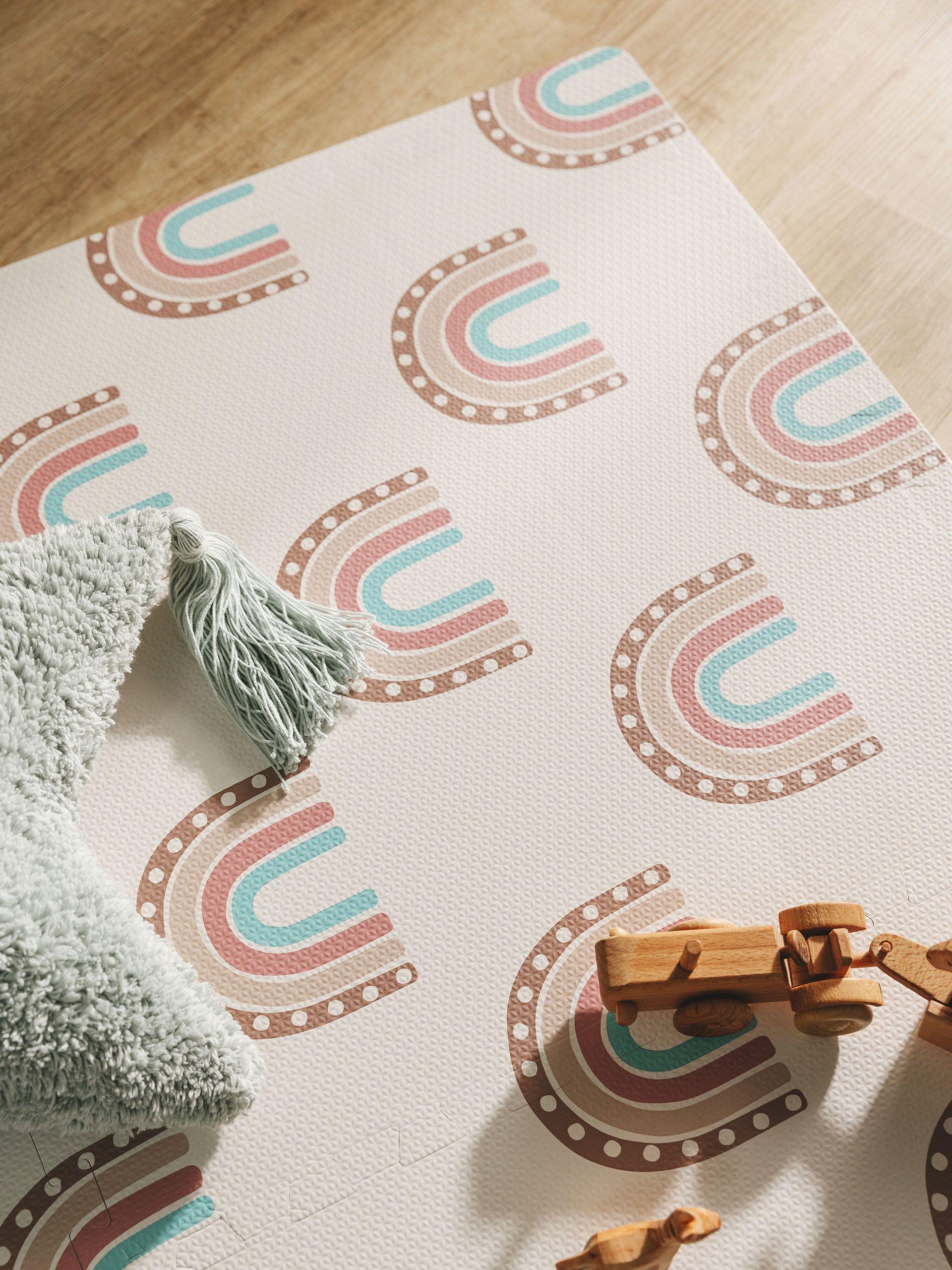 Tapis de jeu arc-en-ciel